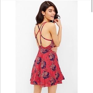 Pink floral strappy Kimchi Blue dress.